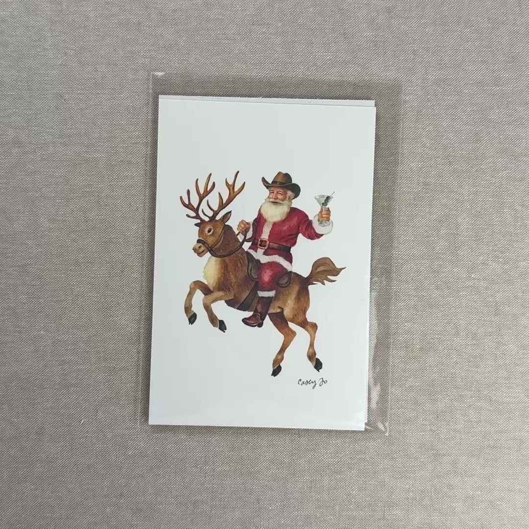 Load video: Cowboy Santa with Martini Art Print